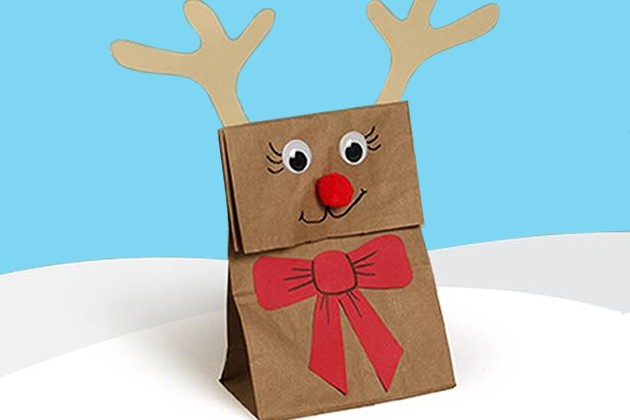 A reindeer gift bag made from a paper bag.