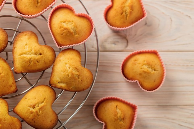 Heart-shaped muffins in silicone baking cups.